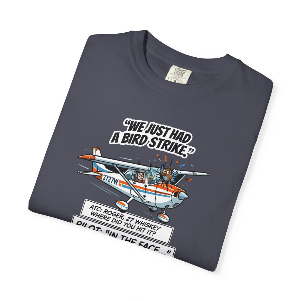 Folded gray t-shirt with graphic design and text on a white background