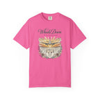 Pink t-shirt with airplane graphic and text on a white background