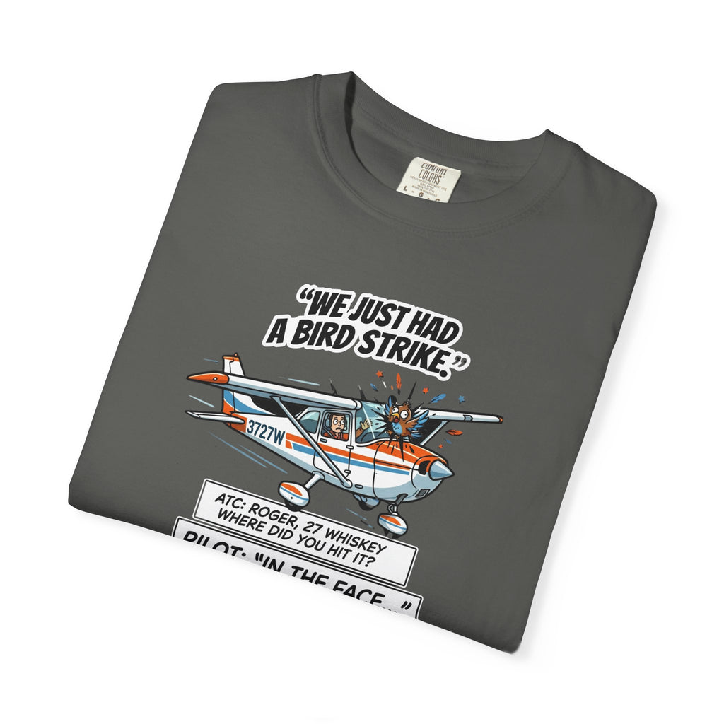 Folded gray t-shirt with graphic design and text on a white background
