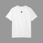 back of White t-shirt with a small black logo on the back against a dark background