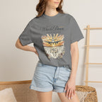 Person wearing a gray t-shirt with a graphic design and text, standing against a neutral background.