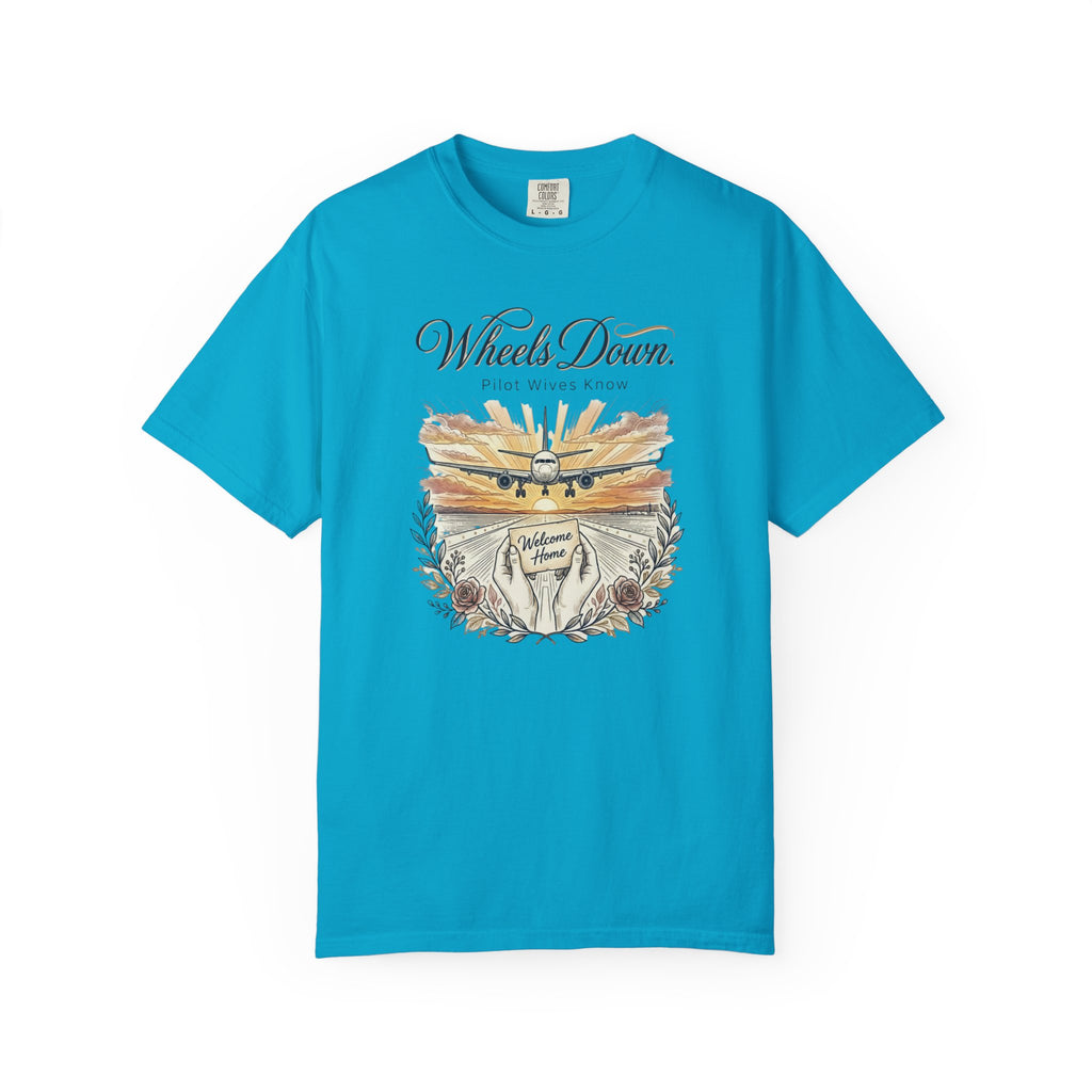 Blue t-shirt with pilot wife graphic design and text on a white background