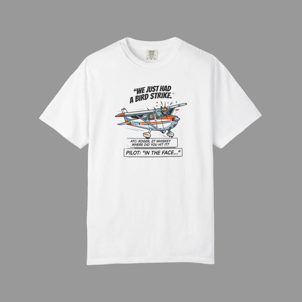 White t-shirt with airplane graphic and humorous text on a white background